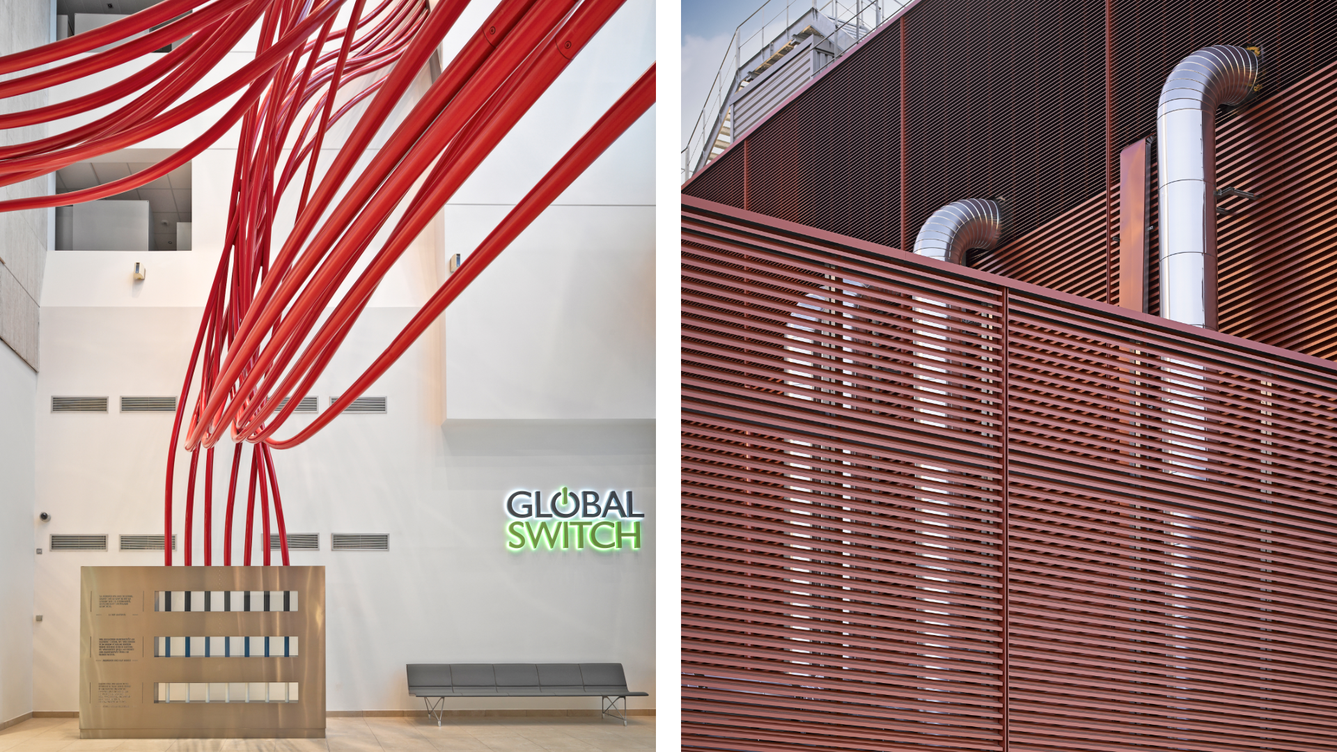 Interior lobby featuring a sculptural tangle of bright red tubes against white walls and a neon 'GLOBAL SWITCH' sign; minimal seating and display panel visible.